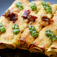Cannelloni ripieni di quark, cipollotto e asparagi gratinati al Parmigiano