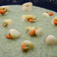 Capesante al burro su crema di taleggio, broccoli e cavolfiori