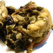 Coniglio con prugne e melanzane