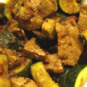 Maiale con salsa di arachidi