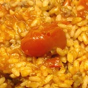 Risotto con salsiccia e pomodorini