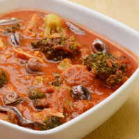 Trippa al sugo con broccoli e acciughe